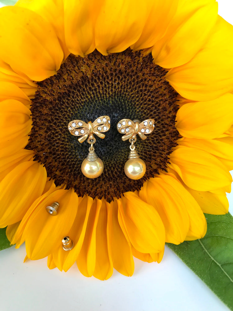 
            
                Load image into Gallery viewer, Diamante Bow &amp;amp; Pearls Studs
            
        