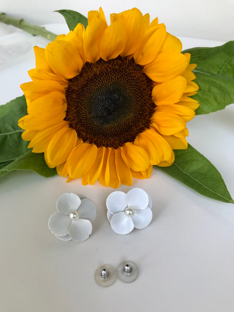 
            
                Load image into Gallery viewer, 60s White Enamel Floral Studs
            
        
